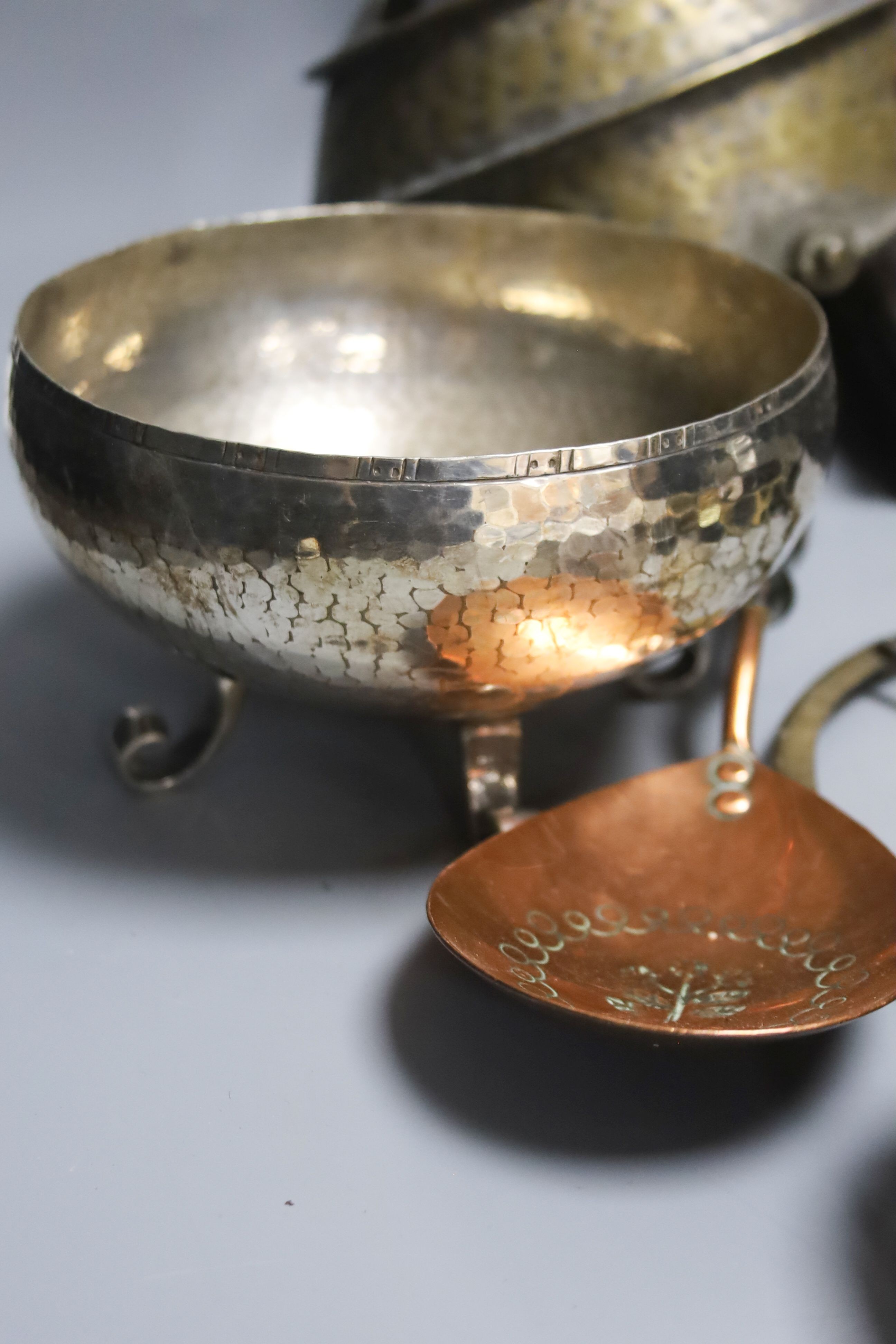 An Arts and Crafts metal light fitting and similar sundry metalware